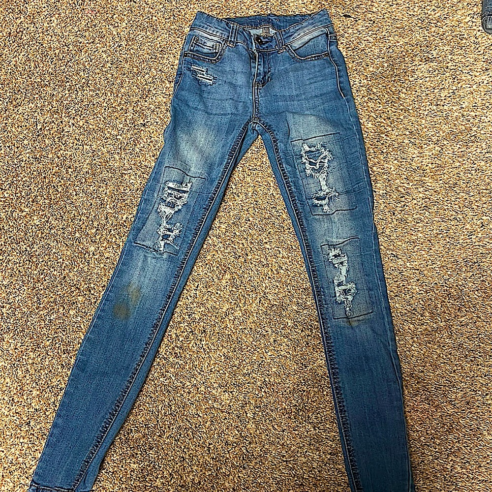 Distressed Blue Jeans